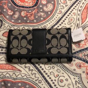 Black signature Coach wallet